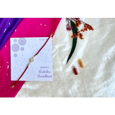 AD square leather strap braclet cum Rakhi.